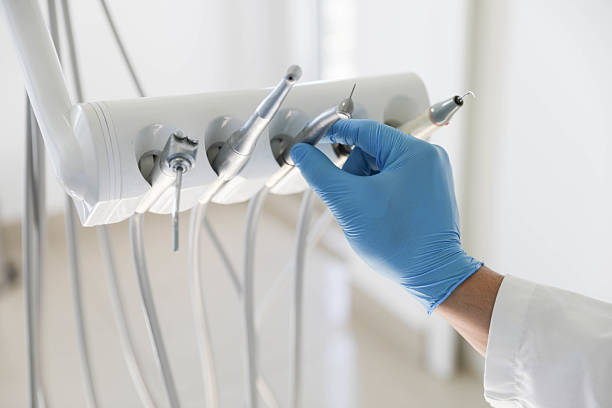 Professional Emergency Dentist technician working in Auburn, MI